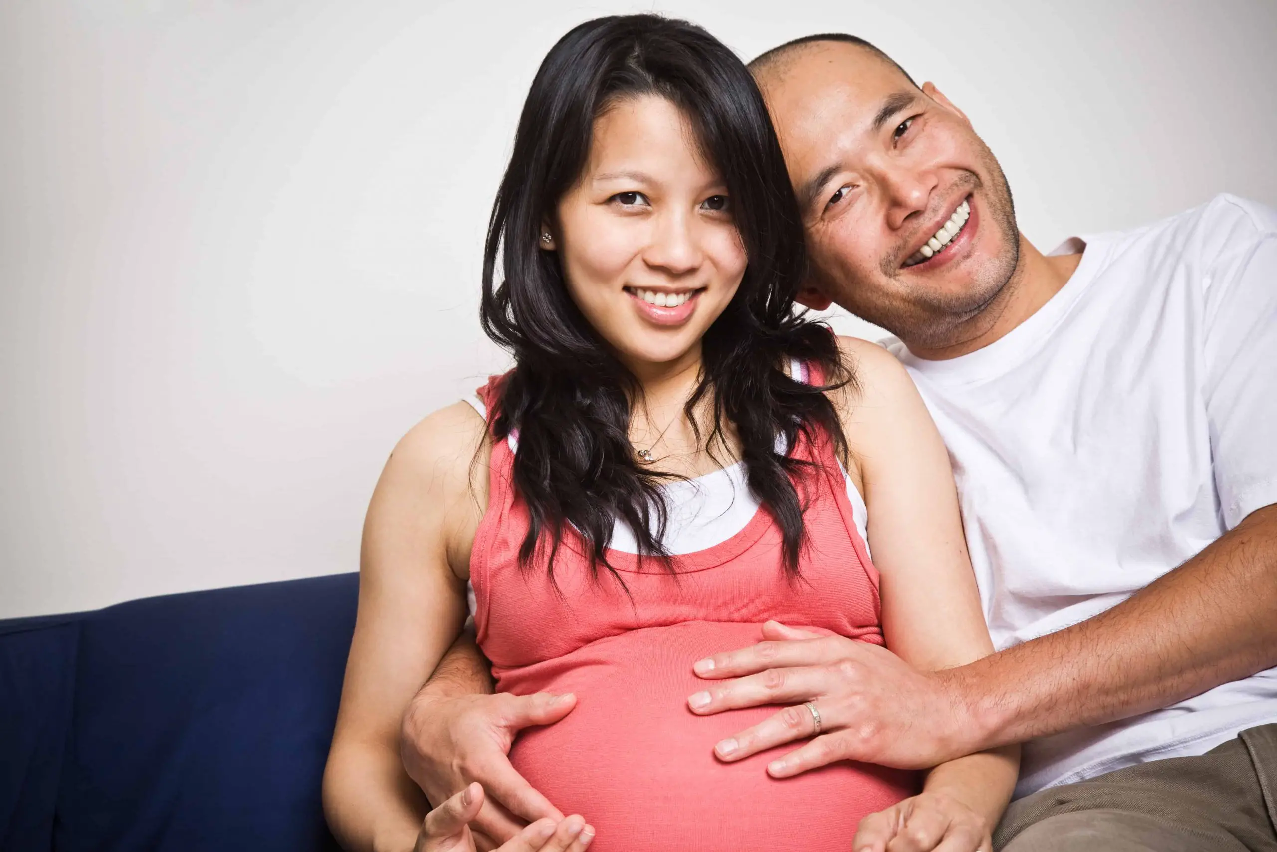Happy Expecting Pregnant Asian Couple