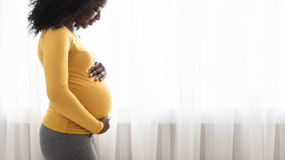 What It Really Means When Your Belly Gets Hard During Pregnancy ...